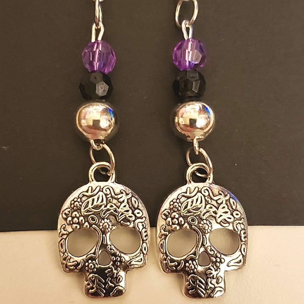 Handmade black silver purple beaded skull dangle earrings